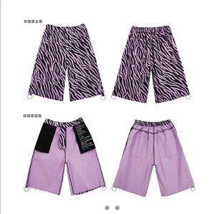 purple zebra print jean shorts on both sides